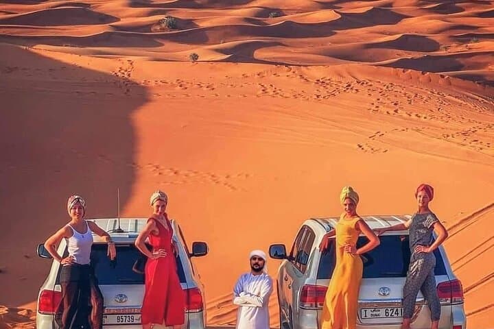 Private Dubai Desert Safari: Camel Ride, Dune Bashing, Sandboarding & BBQ Dinner photo 2