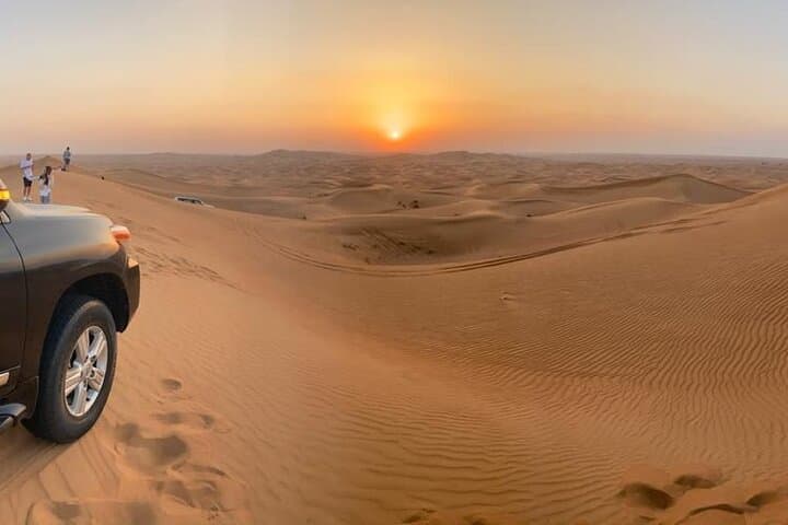 Private Dubai Desert Safari: Camel Ride, Dune Bashing, Sandboarding & BBQ Dinner photo 3