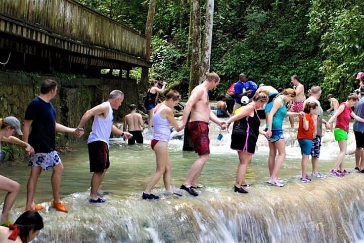 Dunn's River Falls Climb and Luminous Lagoon Night Swim — Tour from Grand Palladium