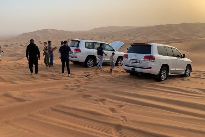 Red Sand Bashing Desert Safari in Dubai — Dune Bashing, Camel Rides & Bedouin Camp photo 1