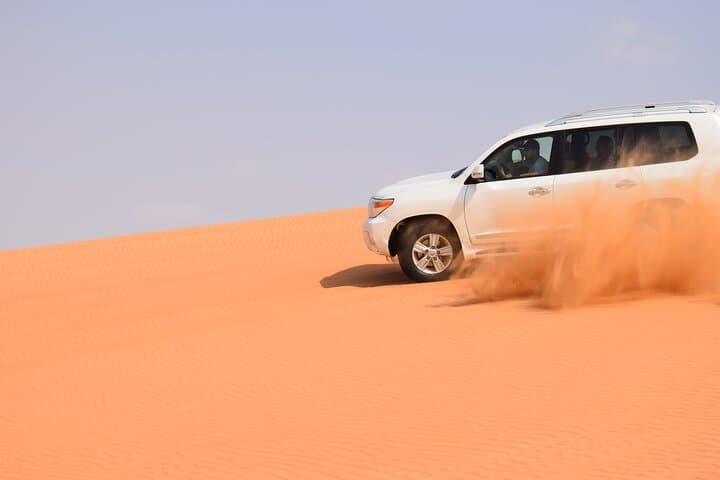 Dubai Evening Desert Safari: Dune Bashing, Camel Ride & Emirati Camp Experience