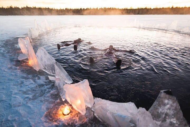 Ice Floating Under the Northern Lights in Rovaniemi photo 3
