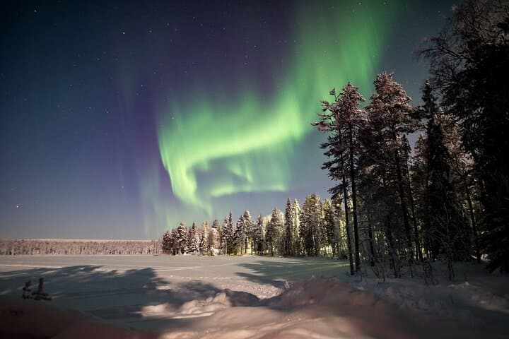 Ice Floating Under the Northern Lights in Rovaniemi photo 4