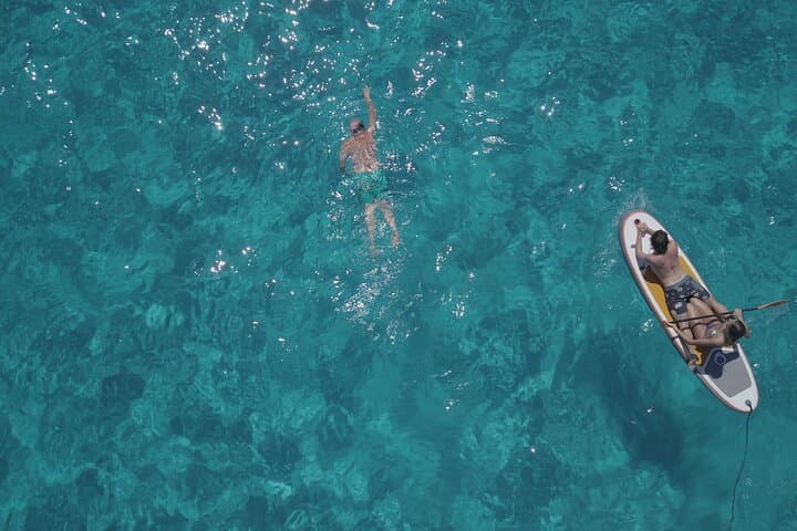 St. Antonio Half-Day Catamaran: Paddle, Snorkel & Beach Shore Excursion in Ibiza photo 4