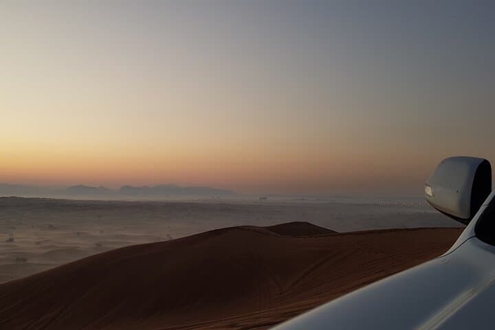 Dubai Sunrise Red Dunes Safari: Private Morning Dune Bashing, Sandboarding & Camel Ride photo 3