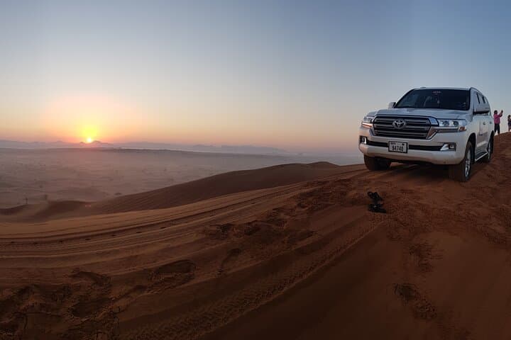 Morning Red Dune Desert Safari Dubai — Camel Ride & Sandboarding photo 2