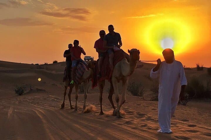 Dubai Sunset Camel Caravan: Sandboarding, Henna & BBQ Desert Experience photo 2