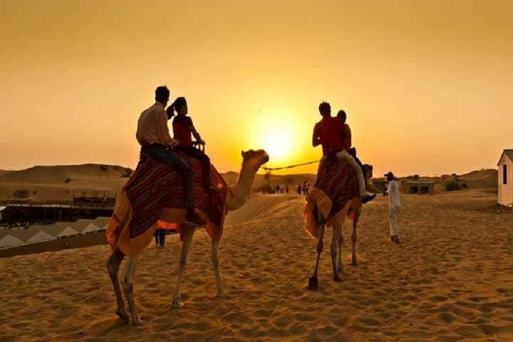 Dubai Sunset Camel Caravan: Sandboarding, Henna & BBQ Desert Experience photo 5