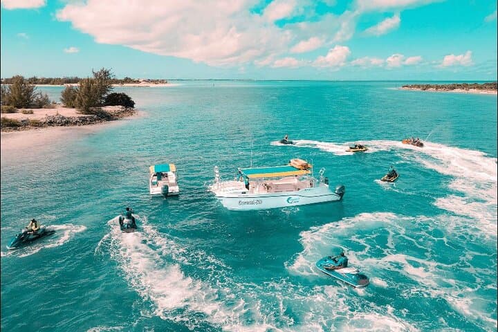 Full-Day Private Boat Charter from Grace Bay: Snorkel Emerald Reef, Visit Iguana Island & Fort George Cay photo 2