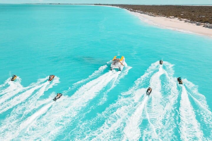 Full-Day Private Boat Charter from Grace Bay: Snorkel Emerald Reef, Visit Iguana Island & Fort George Cay photo 3