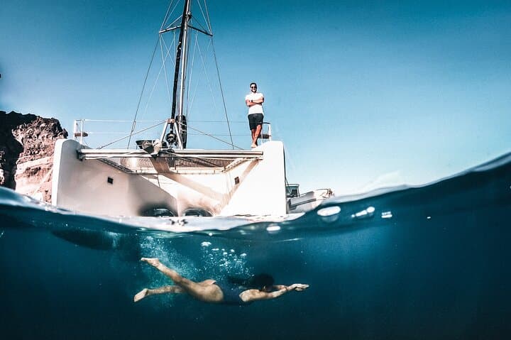 Santorini Private Catamaran Caldera Cruise: All-Inclusive Day & Sunset Sail photo 4