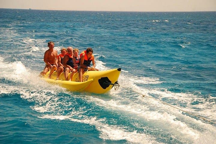 Hurghada Dolphin Tour: Snorkel Reefs, Dolphins & Banana Boat Adventure photo 1