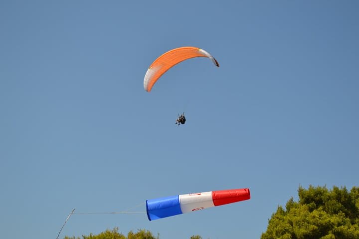Tandem Paragliding Over Corfu’s West Coast — 15-Minute Coastal Flight