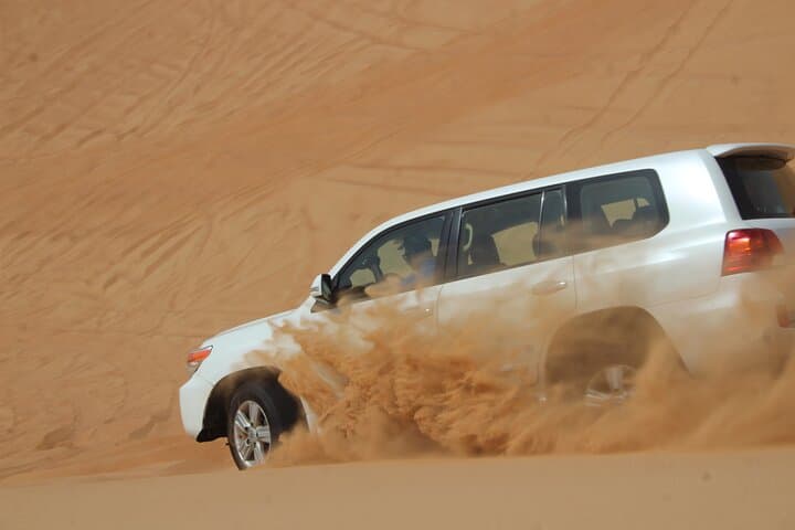 Dubai Red Dunes Safari: Dune Bashing, Sandboarding & Quad Ride photo 4