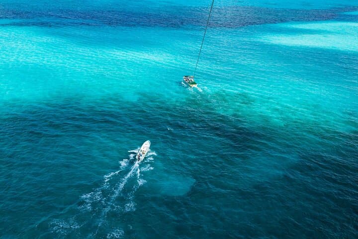 Fly Over Isla Mujeres: Parasailing from Cancun's Shores photo 4