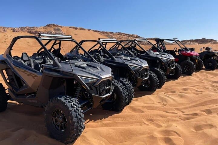 Drive a 1000cc Dune Buggy Across Dubai’s Red Sands: Sunset Safari, Sandboarding & BBQ photo 2