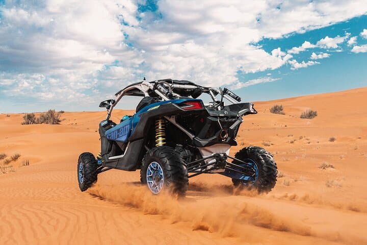 Drive a Can-Am Maverick X3 Turbo Through Dubai’s Red Dunes photo 2