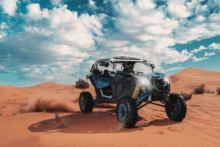 Drive a Can-Am Maverick X3 Turbo Through Dubai’s Red Dunes photo 3