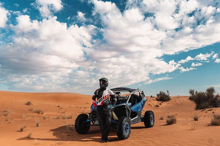 Drive a Can-Am Maverick X3 Turbo Through Dubai’s Red Dunes photo 4