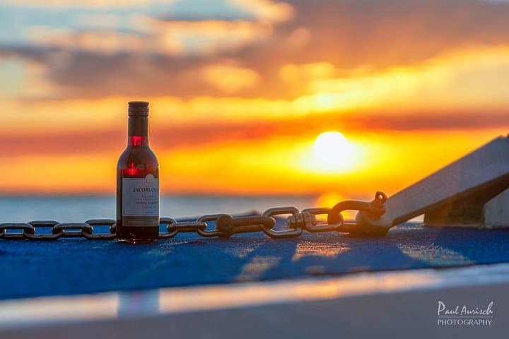 Milbi Sunset Cruise: Champagne, King Prawns & Glass-Bottom Views at Urangan Pier photo 2