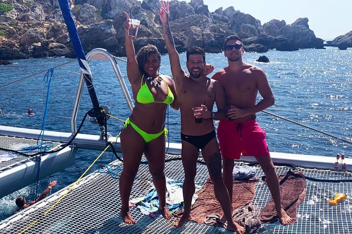 Blue Lagoon Evening Catamaran Cruise: Sunset Sailing to Comino's Turquoise Bays photo 3