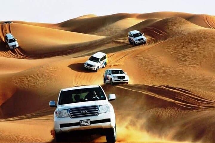 Premium Dubai Desert Safari: Dune Bashing, Camel Ride & Evening Entertainment photo 2