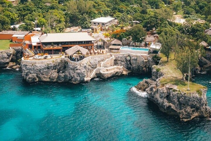 Negril Zipline & Rick's Cafe Combo: Zip, Swim and 7-Mile Beach Day Trip