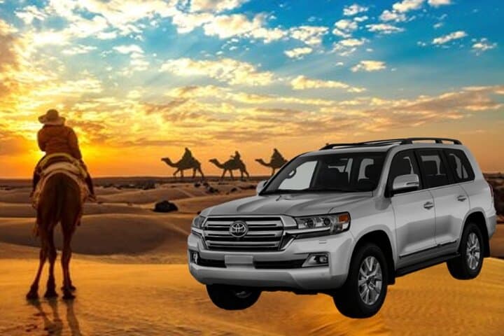 Sunrise Desert Safari Doha — Dune Bashing, Camel Rides & Sandboarding