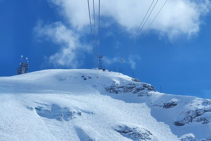 Private Day Trip to Mount Titlis Glacier World from Lucerne — Cableway, Ice Cave & Cliff Walk photo 2