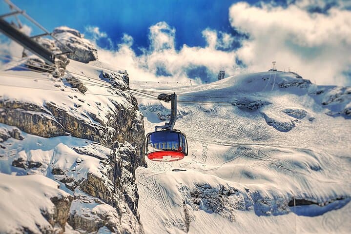 Private Day Trip to Mount Titlis Glacier World from Lucerne — Cableway, Ice Cave & Cliff Walk
