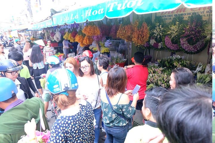 Saigon Morning Scooter Tour: Markets, Temples & Riverside Life photo 4