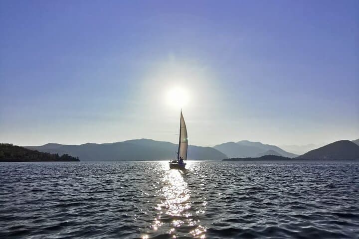 Sunset Sailing on Lake Maggiore: Private Aperitif & Accordion by Santa Caterina del Sasso