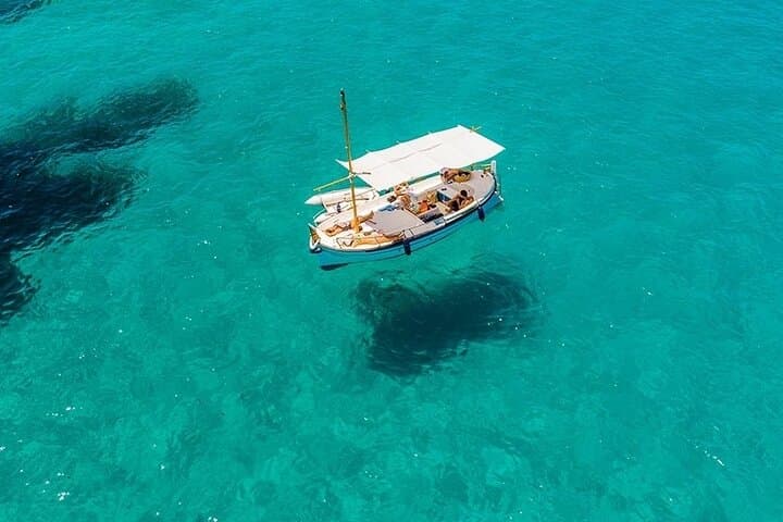 Hidden Coves and Sunset Snorkel: Private 4-Hour Mediterranean Boat Tour in Ibiza photo 1