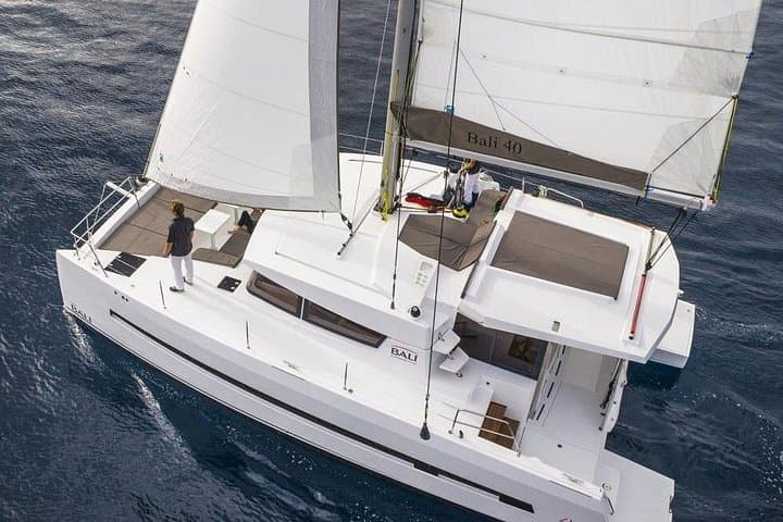 Santorini Luxury Catamaran Cruise: Caldera Sailing, Snorkel & Hot Springs photo 1