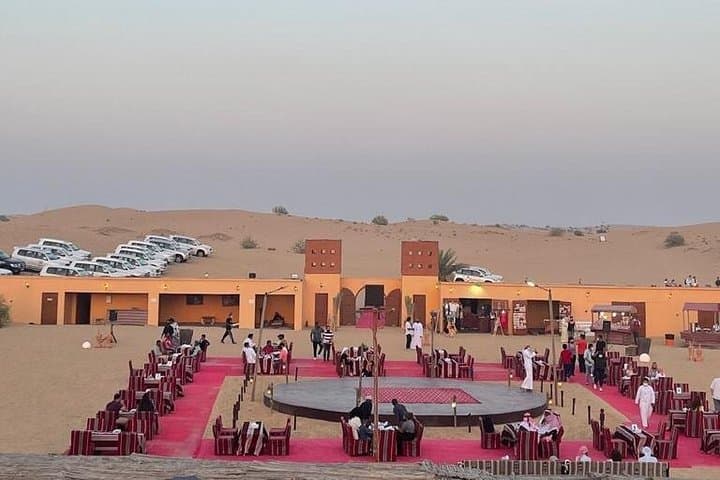 Dubai Desert Safari with Premium BBQ Dinner: Dune Bashing, Camel Rides & Live Shows photo 6