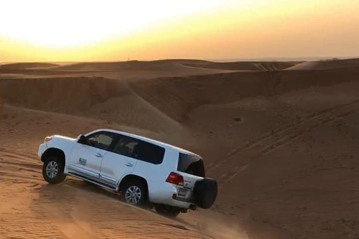 Dubai Desert Safari with Premium BBQ Dinner: Dune Bashing, Camel Rides & Live Shows photo 3