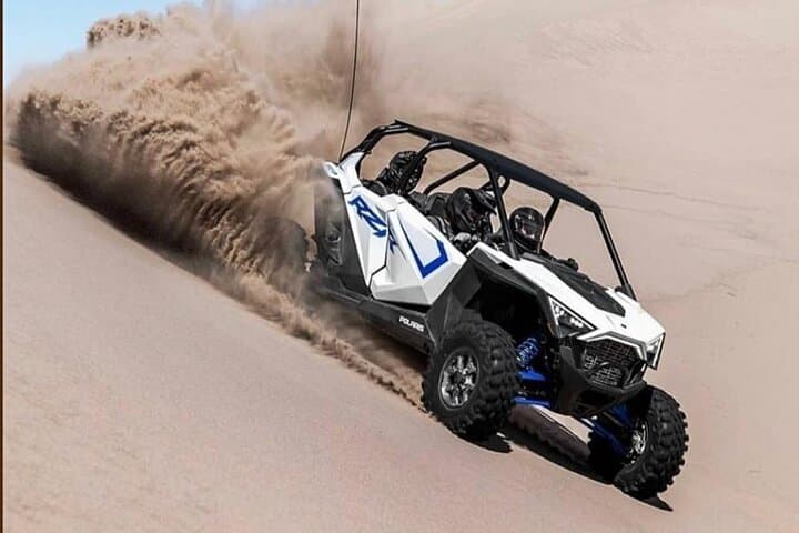 Drive a Polaris RZR X4 Through Dubai Desert Dunes – Guided Buggy Adventure