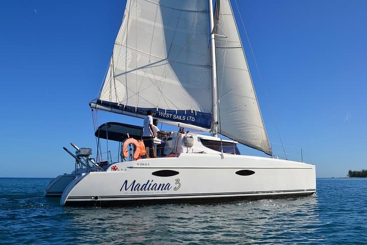 Private Full-Day Catamaran Cruise from Le Morne — Dolphins, Snorkel & Lagoon Lunch