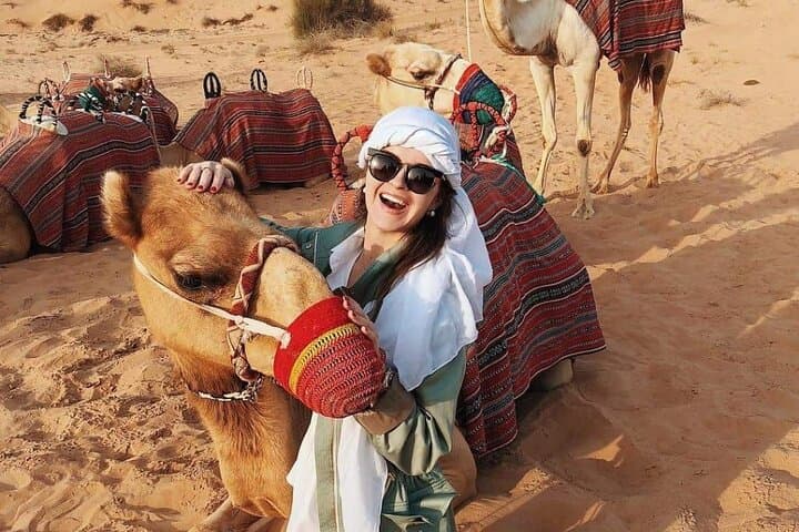 Sunrise Hot-Air Balloon Over Dubai Desert with Falcon Show & Camel Experience photo 1