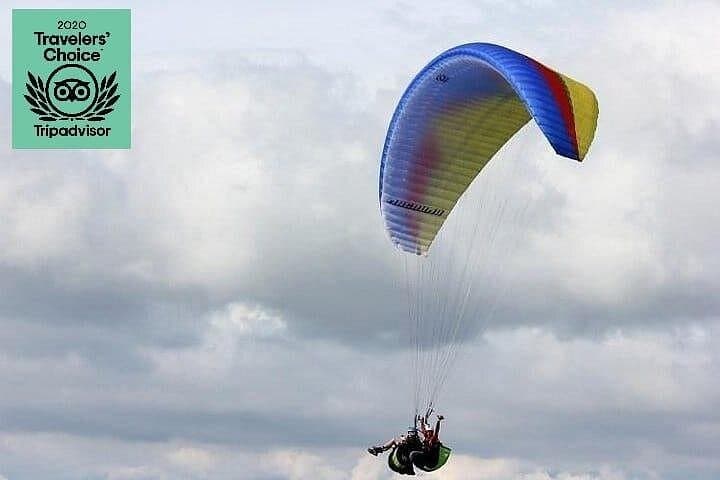 Tandem Paragliding in Medellín: Half-Day Andes Flight with City Views