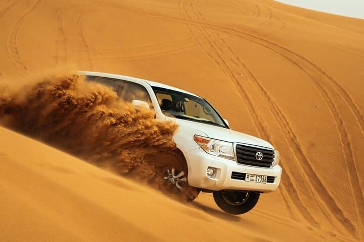 Dubai Full-Day Desert Safari: Dune Driving, Campfire Dinner & Cultural Shows