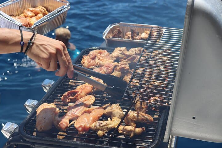 Santorini Platinum Half-Day Catamaran: Red Beach, Hot Springs & Cliffside Views photo 4