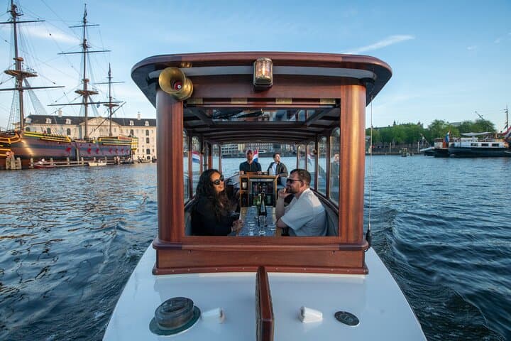 Private 90-Min Historic Saloon Boat Tour in Amsterdam (Welcome Drink Included) photo 2