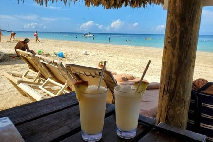Negril Beach and Rick's Cafe: Sunset Cliffs, Seven Mile Sand, and Cliff-Jumping Thrills