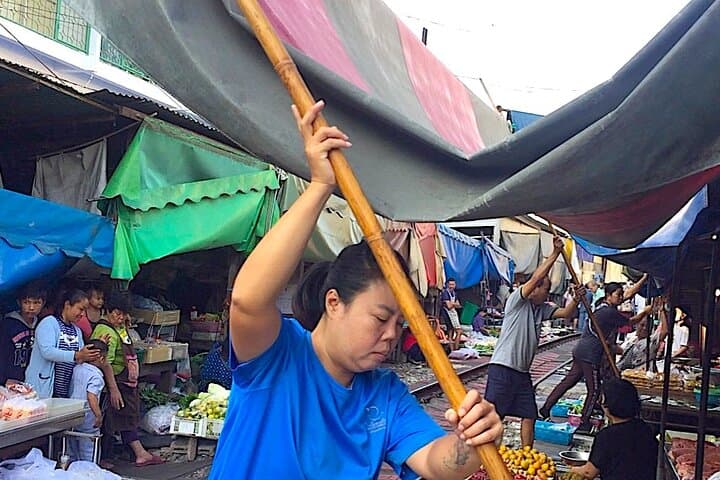 Private Day Tour — Maeklong Railway, Damnoen Saduak Floating Market & Phenomenon Temple photo 2