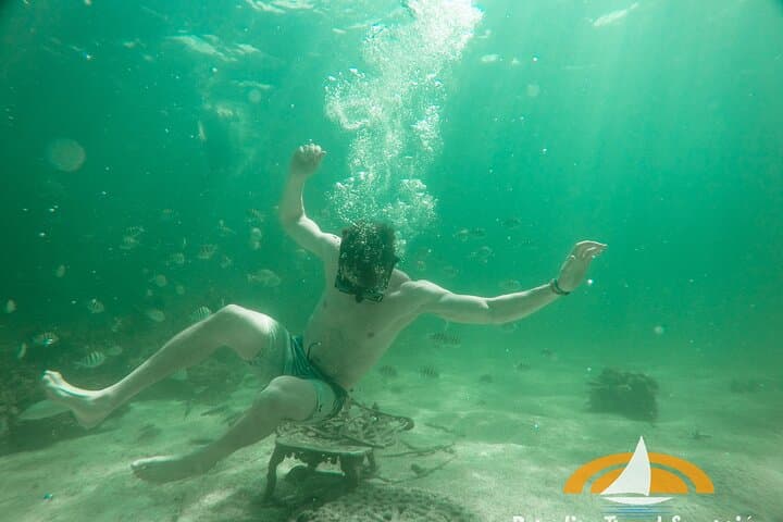 Punta Cana VIP Catamaran Party Cruise: Snorkeling, Natural Pool & Slides photo 6