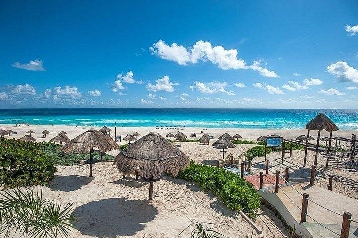 Cancún City Bus Tour: Playa Delfines, Market 28 & Tequila Tasting photo 2
