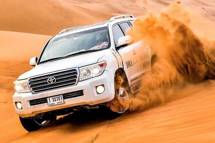 Dubai Evening Desert Safari: Dune Bashing, Camel Ride & BBQ Dinner