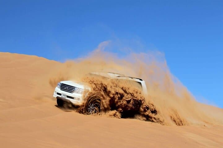 Deluxe Dubai Desert Safari with BBQ Dinner — Evening Dune Bashing & Cultural Camp