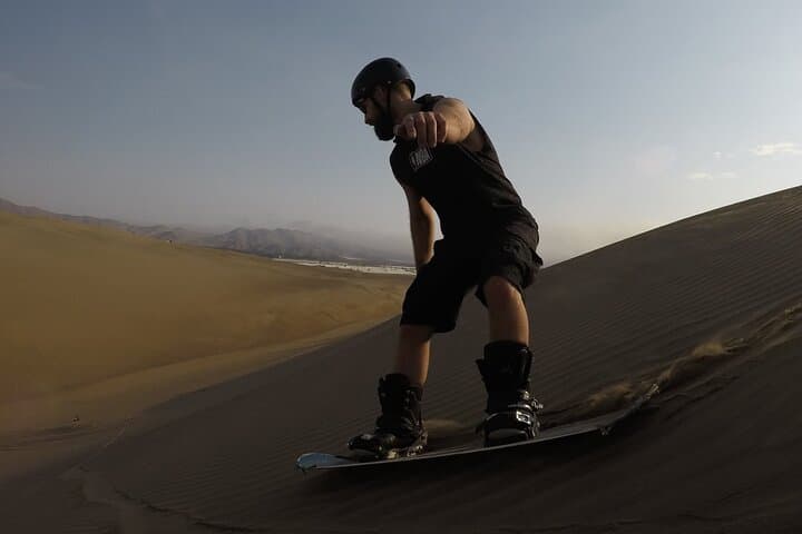 Sandboarding in Huacachina: Dune Buggy Sunset Adventure Near Ica photo 2